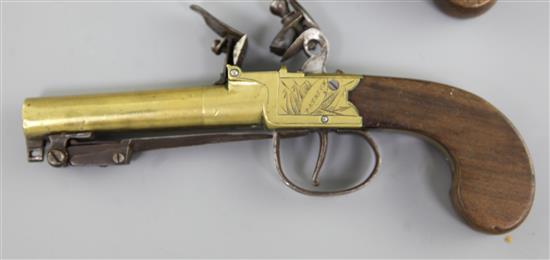 A pair of brass framed and barrelled flintlock boxlock pocket pistols, 8in. (11in with bayonet)